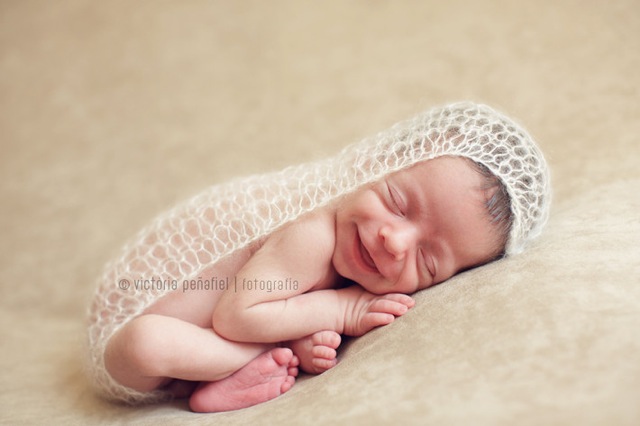 Newborn wrapped with SilkMo wrap amigunuri